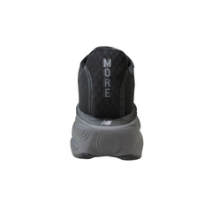 NB v5 Fresh Foam X More Black Grey back view highlighting ergonomic heel collar, cushioned support, and reflective logo for safety.