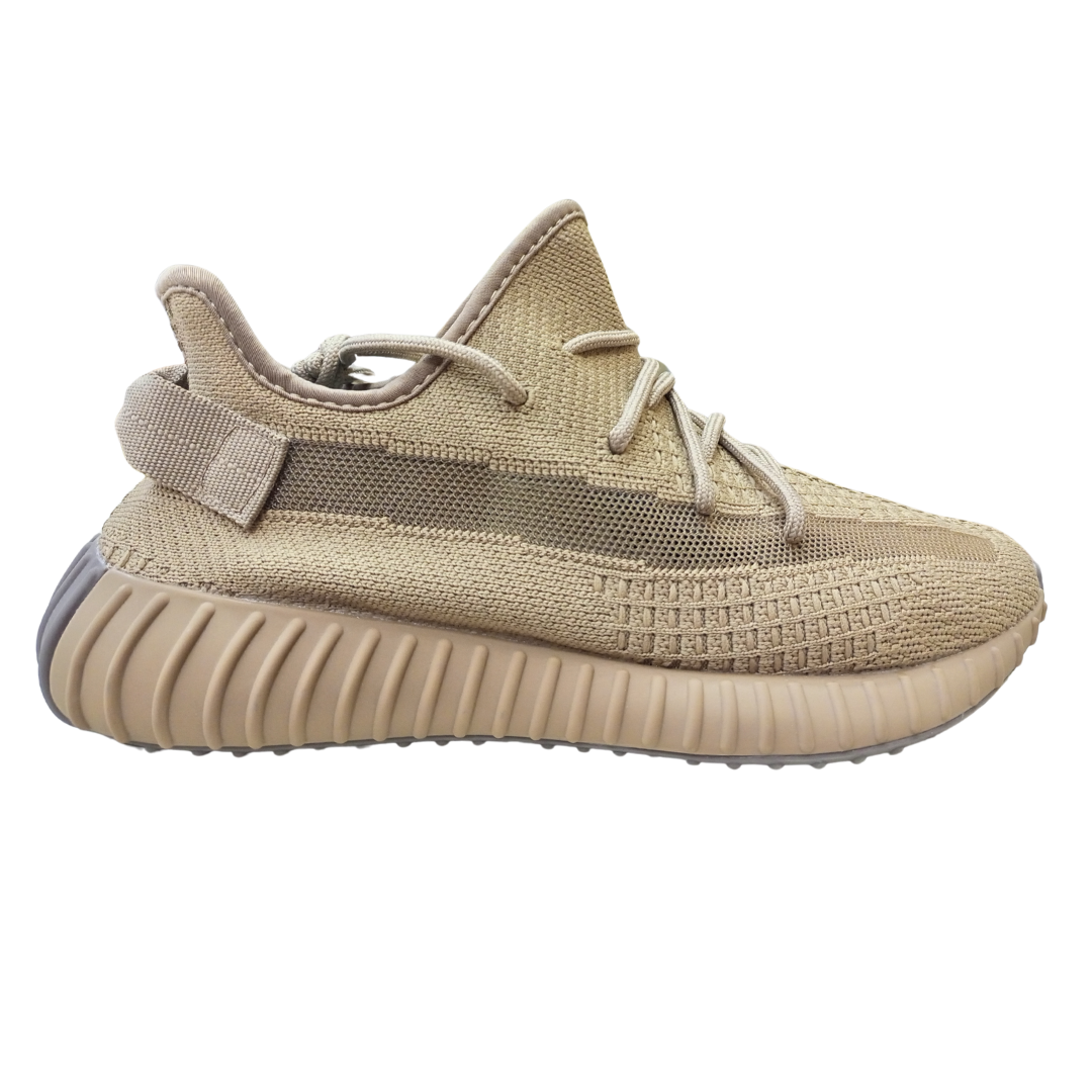 Adii Yeeezzzy 350 Earth sneakers right side profile displaying ergonomic midsole cushioning, neutral colorway, and modern athleisure styling.