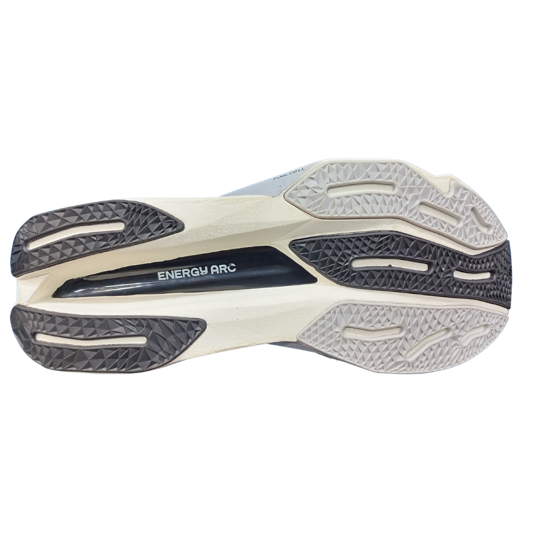 Close-up of NB FuelCell SuperComp Elite v3 sole featuring high-traction rubber outsole for enhanced grip.