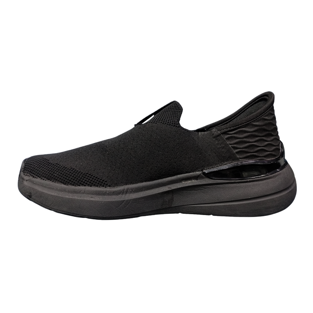 Left side profile of Skechers Max Cushioning Slip-In displaying seamless construction and slip-on convenience.