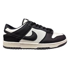 Right side profile of NK Dunk Low ‘Panda’ emphasizing sleek silhouette and retro-inspired design.